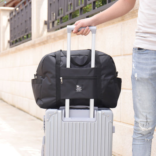 Travel luggage travel bagWaterproof Travel Luggage Bag – Lightweight & Wear-Resistant Travel Duffel with Anti-Theft Design (20–35L)