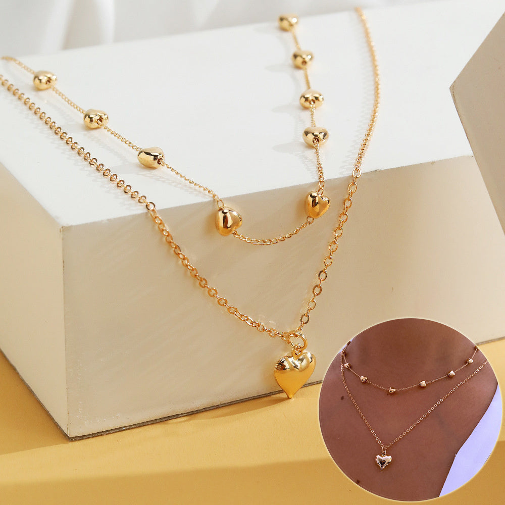 Multilayer Heart Pendant Necklace – Stylish Gold Jewelry Accessory for Women