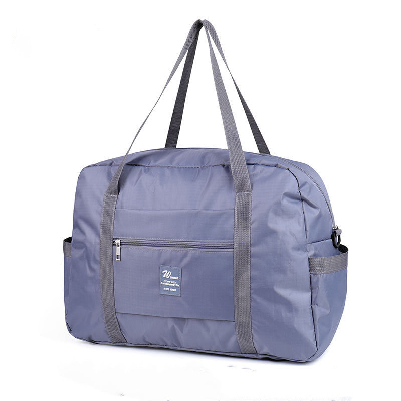Travel luggage travel bagWaterproof Travel Luggage Bag – Lightweight &amp; Wear-Resistant Travel Duffel with Anti-Theft Design (20–35L)