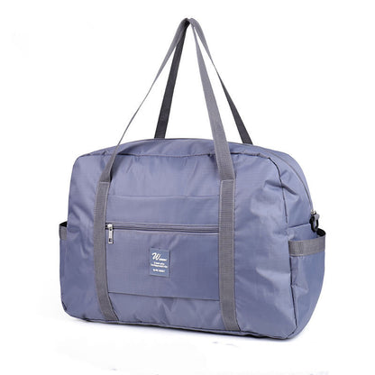 Travel luggage travel bagWaterproof Travel Luggage Bag – Lightweight &amp; Wear-Resistant Travel Duffel with Anti-Theft Design (20–35L)