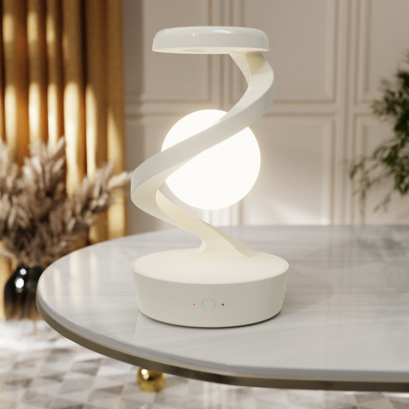Rotating Moon Desk Lamp with Wireless Phone Charging – Futuristic Glow Meets Modern Functionality