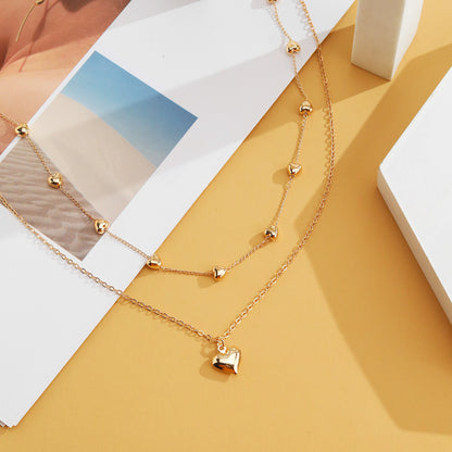 Multilayer Heart Pendant Necklace – Stylish Gold Jewelry Accessory for Women
