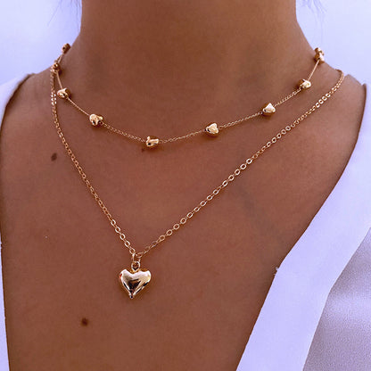 Multilayer Heart Pendant Necklace – Stylish Gold Jewelry Accessory for Women