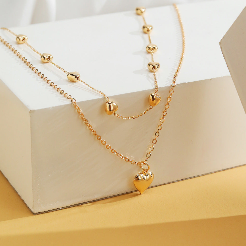Multilayer Heart Pendant Necklace – Stylish Gold Jewelry Accessory for Women