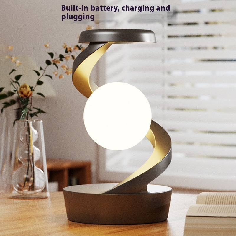 Rotating Moon Desk Lamp with Wireless Phone Charging – Futuristic Glow Meets Modern Functionality