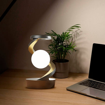 Rotating Moon Desk Lamp with Wireless Phone Charging – Futuristic Glow Meets Modern Functionality